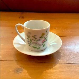 PORCELAIN DEMI TASSE CUP & SAUCER. WHITE/FLORAL. NEW.